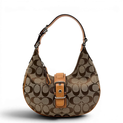 https://cdn.shopify.com/s/files/1/0564/9376/8855/files/Coach_Schultertasche_Croissant_Signature_beige___braun_1.webp?v=1782312030