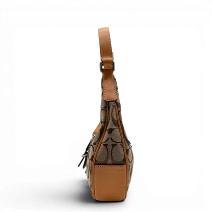 https://cdn.shopify.com/s/files/1/0564/9376/8855/files/Coach_Schultertasche_Croissant_Signature_beige___braun_3.webp?v=1782312030