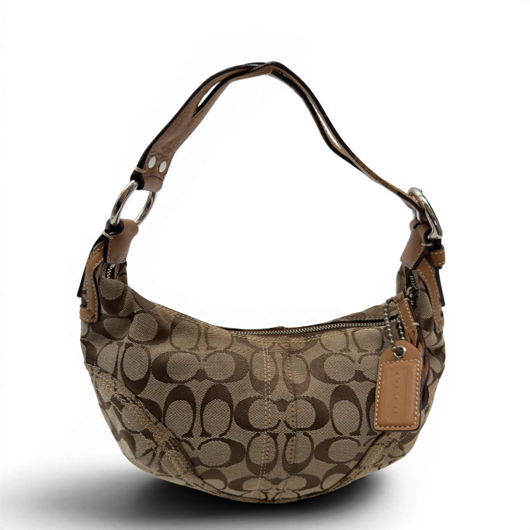 https://cdn.shopify.com/s/files/1/0564/9376/8855/files/Coach_Schultertasche_Hobo_Half_Moon_Signature_beige_1.webp?v=1782897227