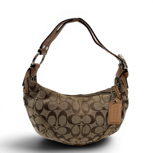 https://cdn.shopify.com/s/files/1/0564/9376/8855/files/Coach_Schultertasche_Hobo_Half_Moon_Signature_beige_1.webp?v=1782897227