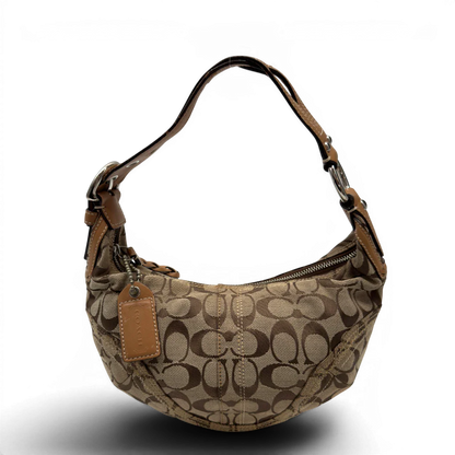 https://cdn.shopify.com/s/files/1/0564/9376/8855/files/Coach_Schultertasche_Hobo_Half_Moon_Signature_beige_4.webp?v=1782897226