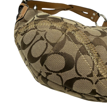 https://cdn.shopify.com/s/files/1/0564/9376/8855/files/Coach_Schultertasche_Hobo_Half_Moon_Signature_beige_6.webp?v=1782897227