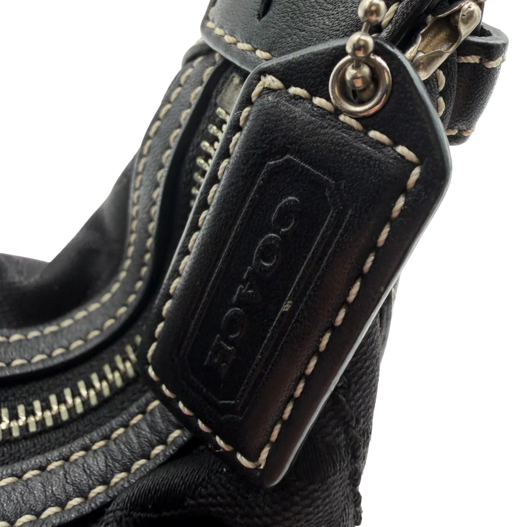 https://cdn.shopify.com/s/files/1/0564/9376/8855/files/Coach_Schultertasche_Hobo_Half_Moon_Signature_schwarz_11.webp?v=1782311633