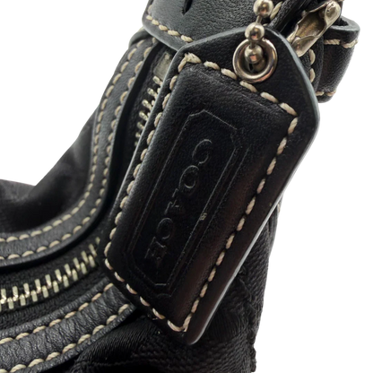 https://cdn.shopify.com/s/files/1/0564/9376/8855/files/Coach_Schultertasche_Hobo_Half_Moon_Signature_schwarz_11.webp?v=1782311633
