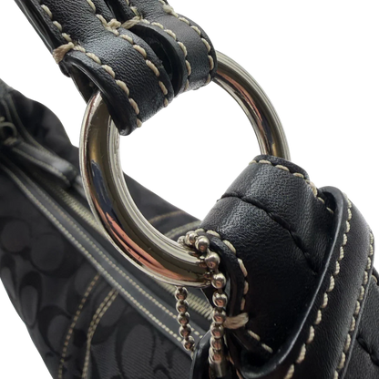 https://cdn.shopify.com/s/files/1/0564/9376/8855/files/Coach_Schultertasche_Hobo_Half_Moon_Signature_schwarz_12.webp?v=1782311633