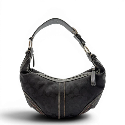 https://cdn.shopify.com/s/files/1/0564/9376/8855/files/Coach_Schultertasche_Hobo_Half_Moon_Signature_schwarz_2.webp?v=1782311633