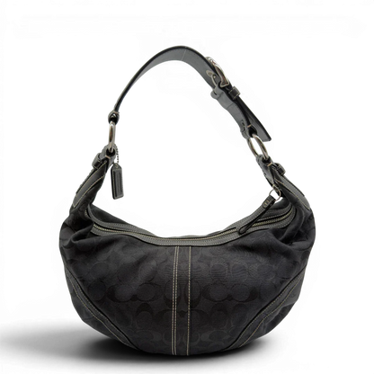 https://cdn.shopify.com/s/files/1/0564/9376/8855/files/Coach_Schultertasche_Hobo_Half_Moon_Signature_schwarz_vintage7353.webp?v=1778671516