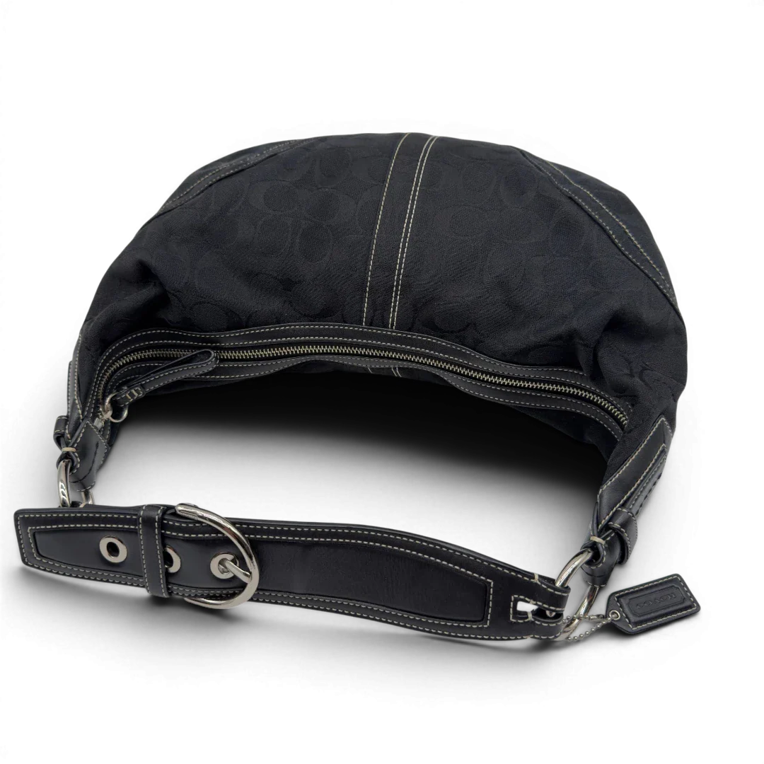 https://cdn.shopify.com/s/files/1/0564/9376/8855/files/Coach_Schultertasche_Hobo_Half_Moon_Signature_schwarz_vintage7361.webp?v=1778671516