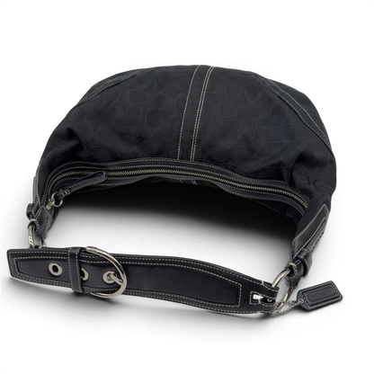 https://cdn.shopify.com/s/files/1/0564/9376/8855/files/Coach_Schultertasche_Hobo_Half_Moon_Signature_schwarz_vintage7361.webp?v=1778671516