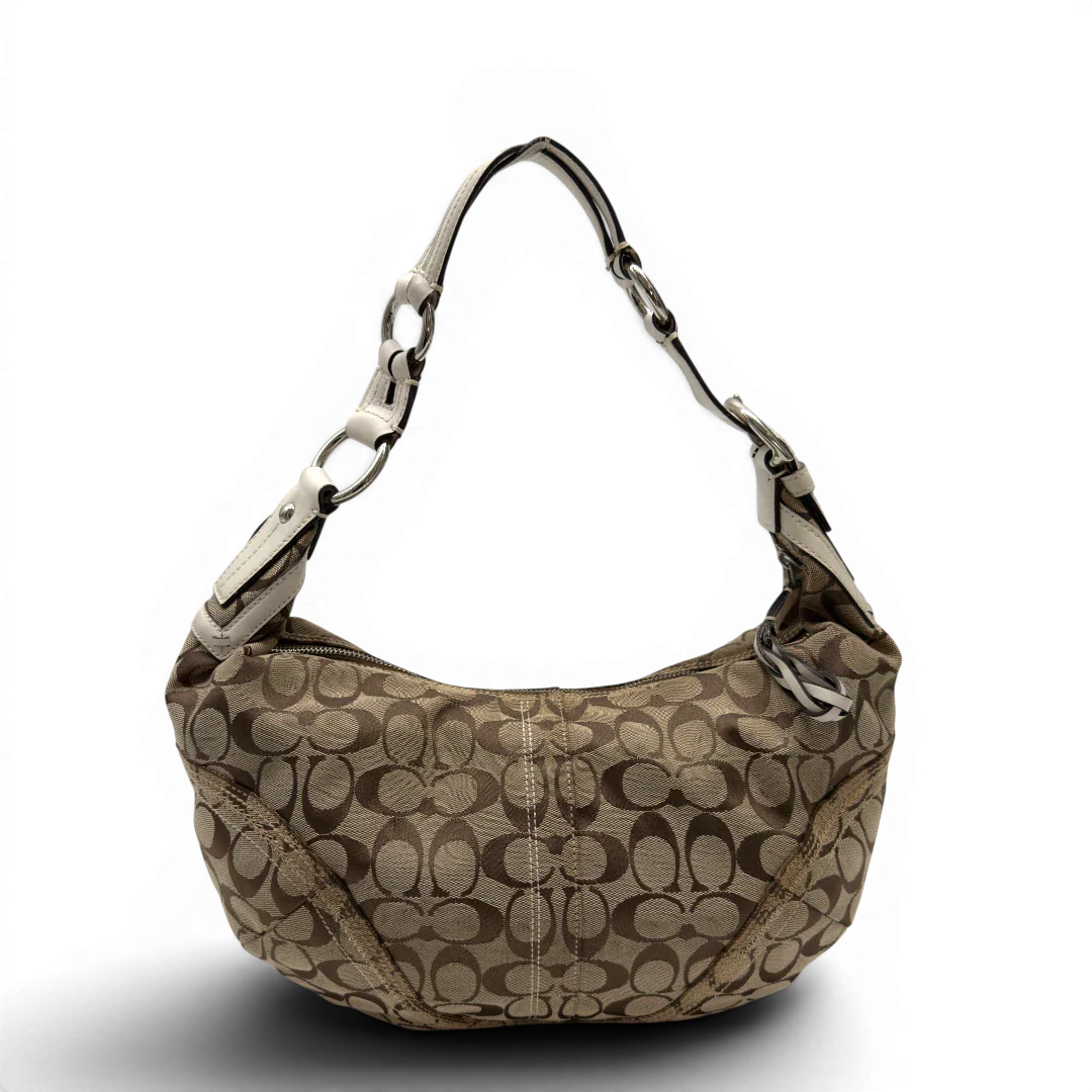 https://cdn.shopify.com/s/files/1/0564/9376/8855/files/Coach_Schultertasche_Hobo_Signature_beige_1.webp?v=1782896788