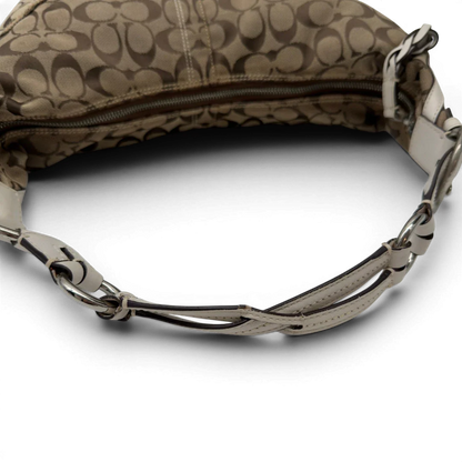 https://cdn.shopify.com/s/files/1/0564/9376/8855/files/Coach_Schultertasche_Hobo_Signature_beige_10.webp?v=1782896788