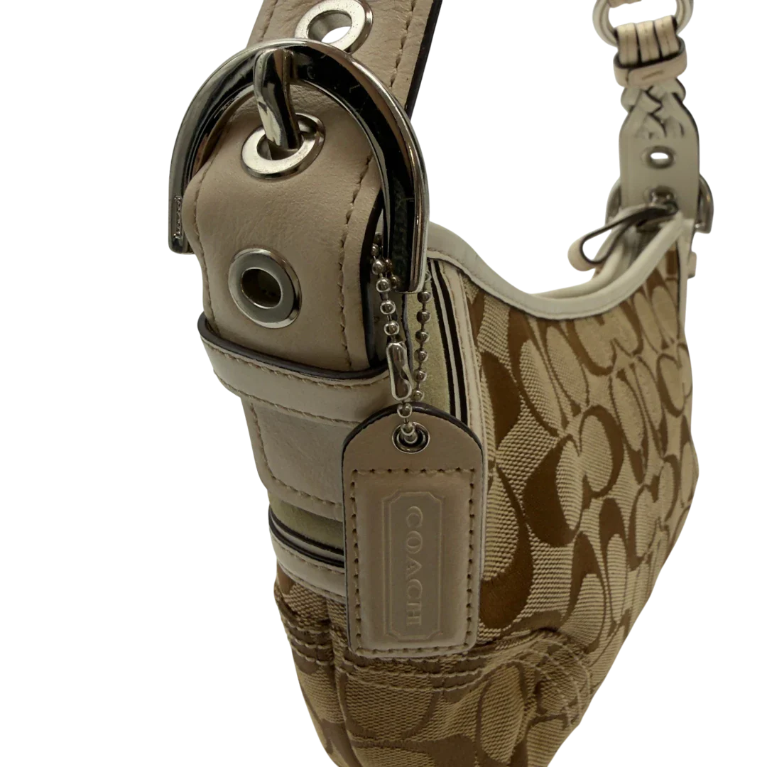 https://cdn.shopify.com/s/files/1/0564/9376/8855/files/Coach_Schultertasche_Hobo_Signature_beige_11_f89df2c4-24f3-4152-b08e-dc24b787dbbf.webp?v=1782904467