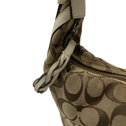 https://cdn.shopify.com/s/files/1/0564/9376/8855/files/Coach_Schultertasche_Hobo_Signature_beige_12.webp?v=1782896788
