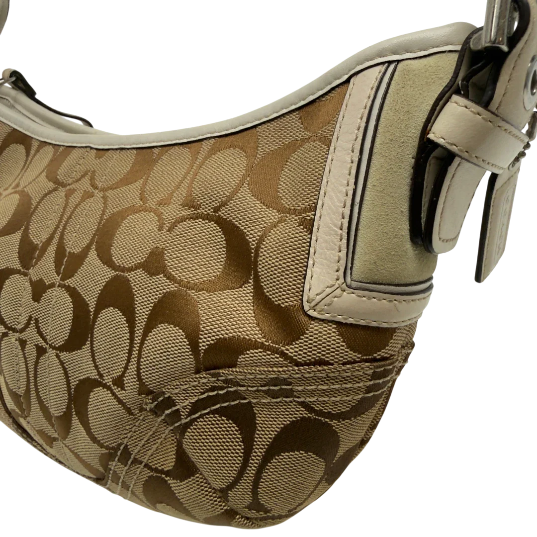 https://cdn.shopify.com/s/files/1/0564/9376/8855/files/Coach_Schultertasche_Hobo_Signature_beige_14_bad3adac-637a-48b5-962c-5300be8972ed.webp?v=1782904467