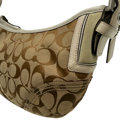 https://cdn.shopify.com/s/files/1/0564/9376/8855/files/Coach_Schultertasche_Hobo_Signature_beige_14_bad3adac-637a-48b5-962c-5300be8972ed.webp?v=1782904467