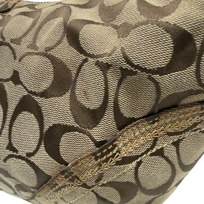 https://cdn.shopify.com/s/files/1/0564/9376/8855/files/Coach_Schultertasche_Hobo_Signature_beige_15.webp?v=1782896788
