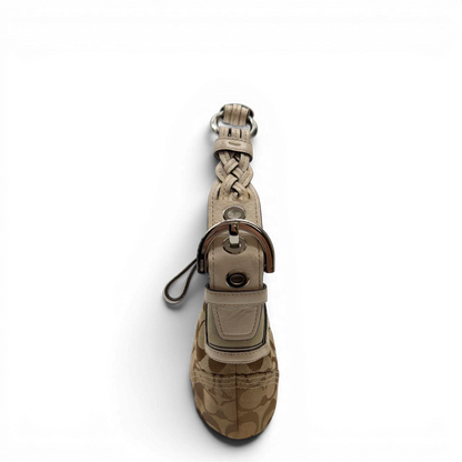 https://cdn.shopify.com/s/files/1/0564/9376/8855/files/Coach_Schultertasche_Hobo_Signature_beige_3_805e88e1-200f-48d1-87ae-f45e027dfefa.webp?v=1782904467