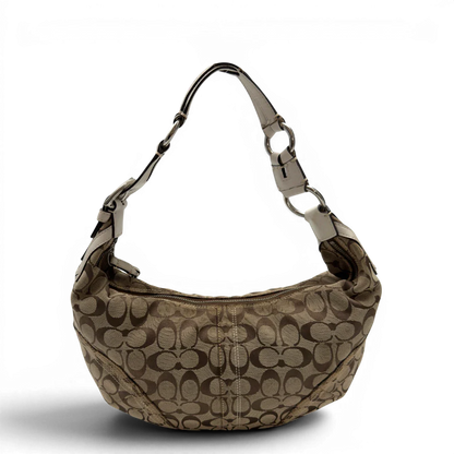 https://cdn.shopify.com/s/files/1/0564/9376/8855/files/Coach_Schultertasche_Hobo_Signature_beige_4.webp?v=1782896788