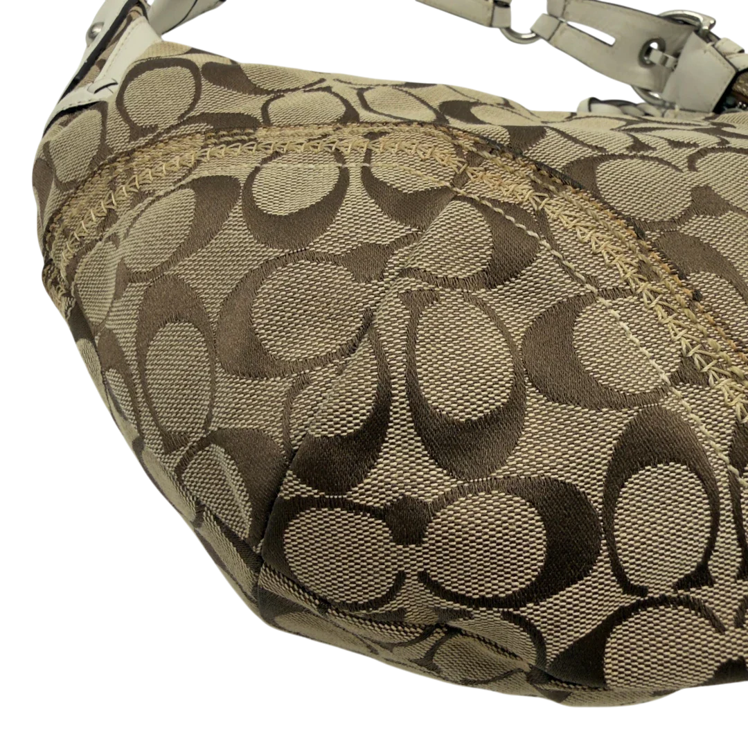 https://cdn.shopify.com/s/files/1/0564/9376/8855/files/Coach_Schultertasche_Hobo_Signature_beige_6.webp?v=1782896788