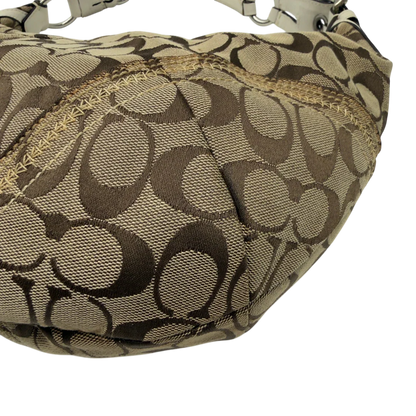 https://cdn.shopify.com/s/files/1/0564/9376/8855/files/Coach_Schultertasche_Hobo_Signature_beige_7.webp?v=1782896788