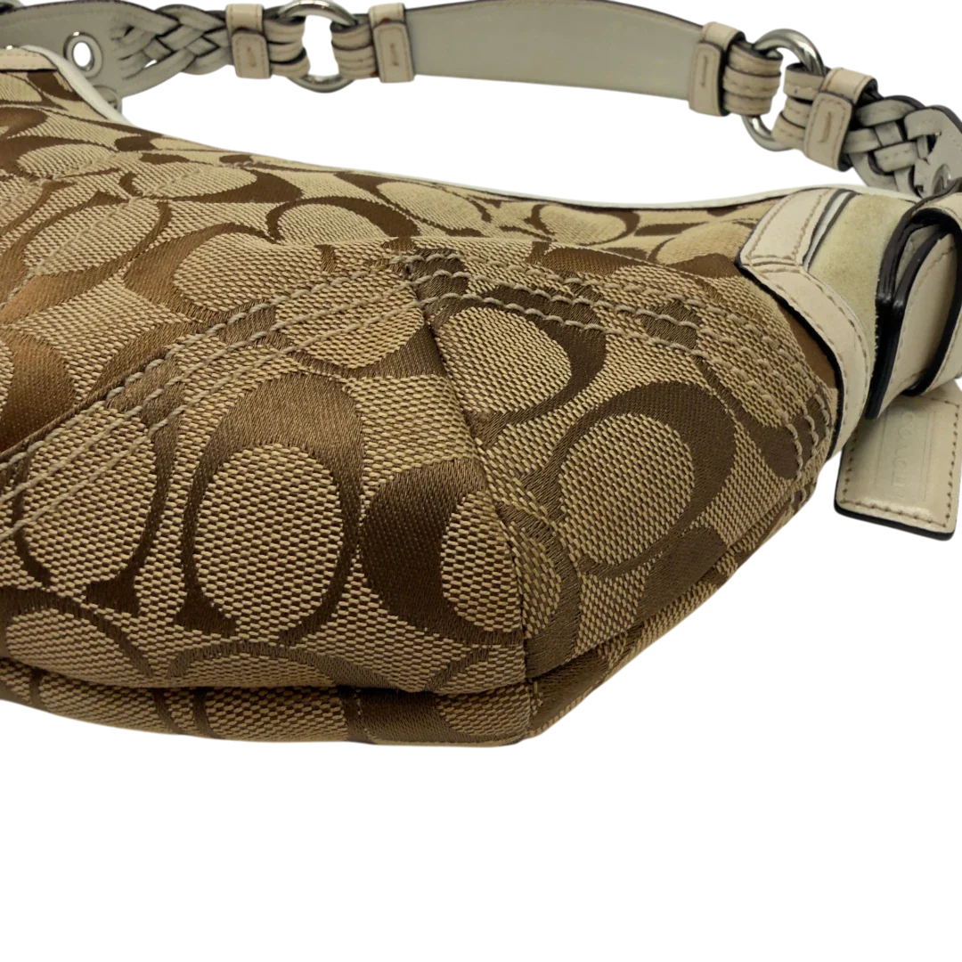 https://cdn.shopify.com/s/files/1/0564/9376/8855/files/Coach_Schultertasche_Hobo_Signature_beige_7_bc167209-f94c-4698-b24c-d65110c1fe82.webp?v=1782904468