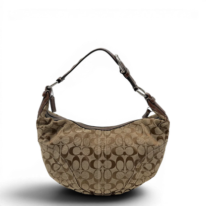 https://cdn.shopify.com/s/files/1/0564/9376/8855/files/Coach_Schultertasche_Hobo_Signature_beige___braun_vintage7887.webp?v=1780490025