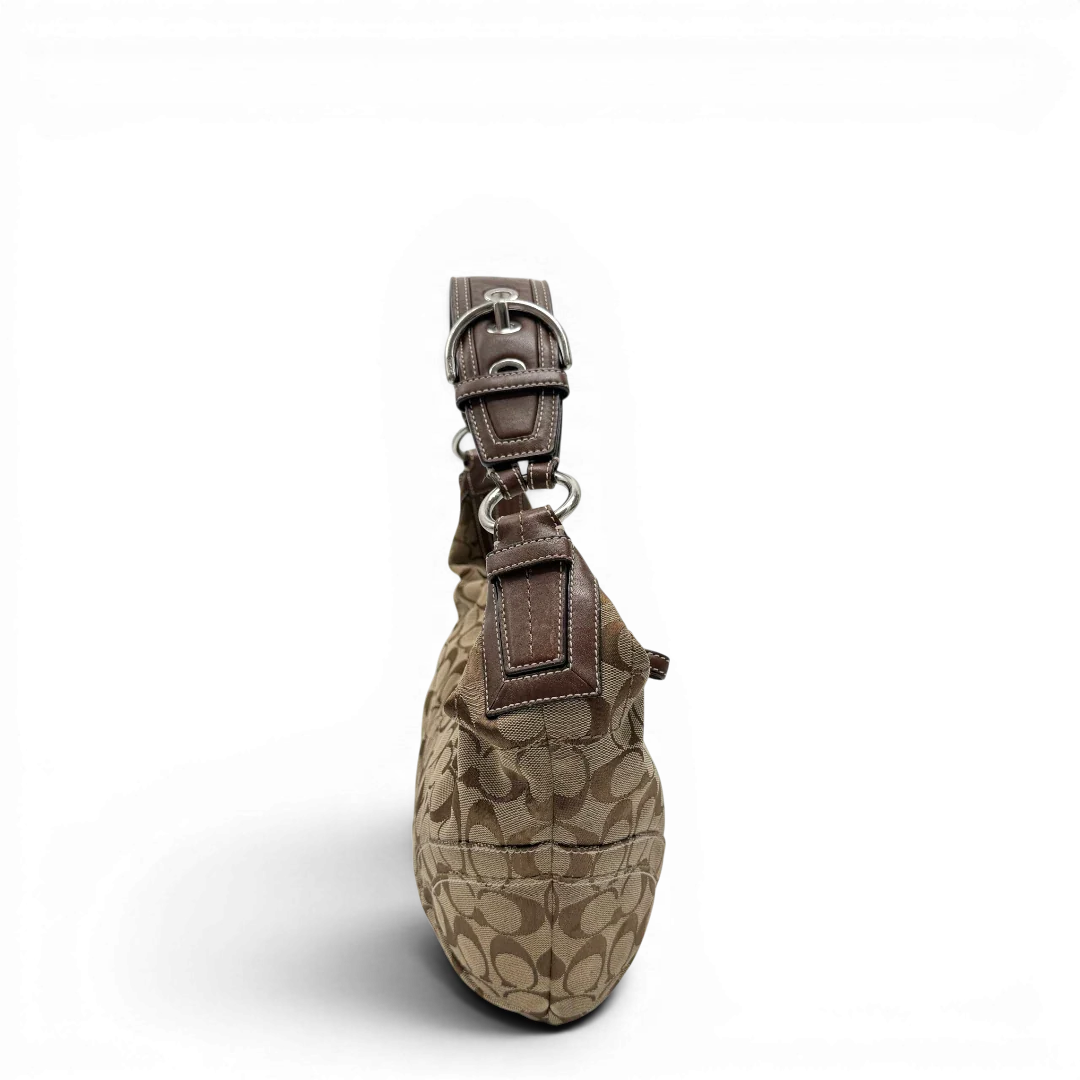 https://cdn.shopify.com/s/files/1/0564/9376/8855/files/Coach_Schultertasche_Hobo_Signature_beige___braun_vintage7889.webp?v=1780490024