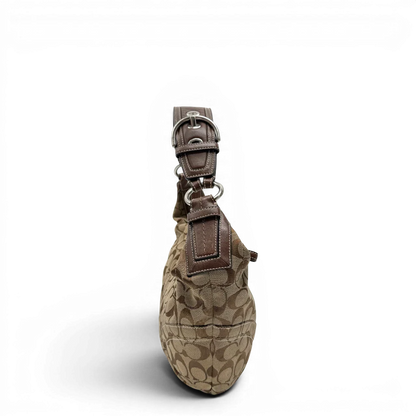 https://cdn.shopify.com/s/files/1/0564/9376/8855/files/Coach_Schultertasche_Hobo_Signature_beige___braun_vintage7889.webp?v=1780490024