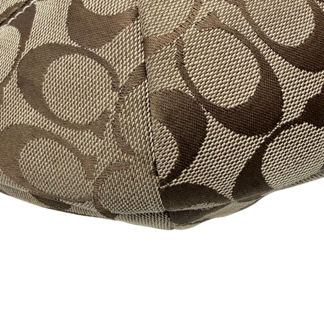 https://cdn.shopify.com/s/files/1/0564/9376/8855/files/Coach_Schultertasche_Hobo_Signature_beige___braun_vintage7892.webp?v=1780490025