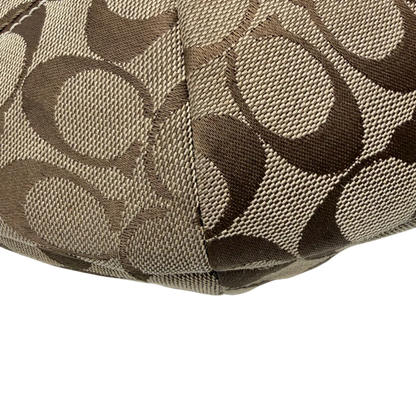 https://cdn.shopify.com/s/files/1/0564/9376/8855/files/Coach_Schultertasche_Hobo_Signature_beige___braun_vintage7892.webp?v=1780490025
