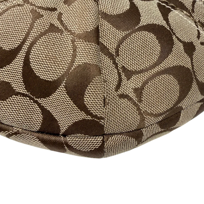 https://cdn.shopify.com/s/files/1/0564/9376/8855/files/Coach_Schultertasche_Hobo_Signature_beige___braun_vintage7893.webp?v=1780490025