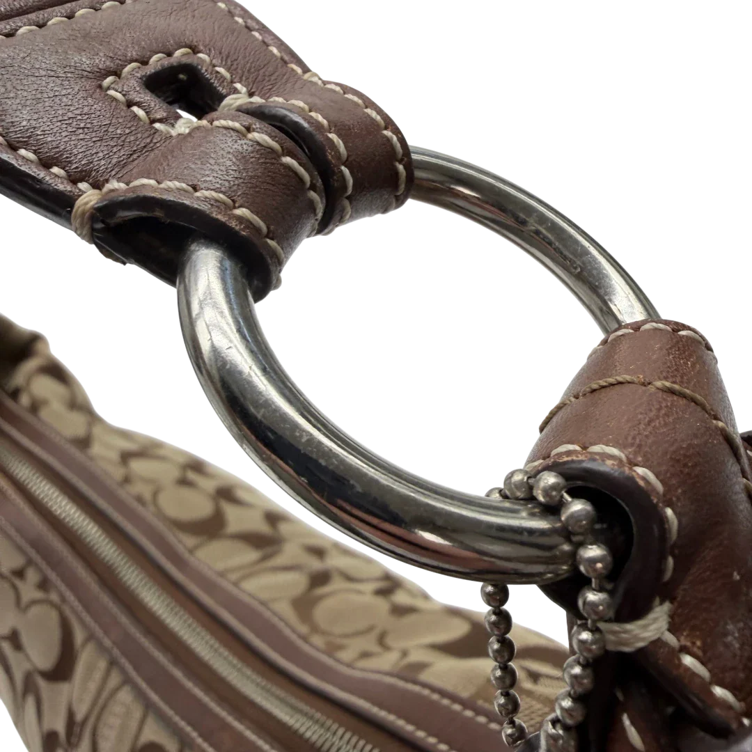 https://cdn.shopify.com/s/files/1/0564/9376/8855/files/Coach_Schultertasche_Hobo_Signature_beige___braun_vintage7897.webp?v=1780490024