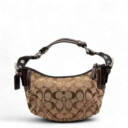 https://cdn.shopify.com/s/files/1/0564/9376/8855/files/Coach_Schultertasche_Hobo_Signature_beige_vintage5185.png?v=1776767869