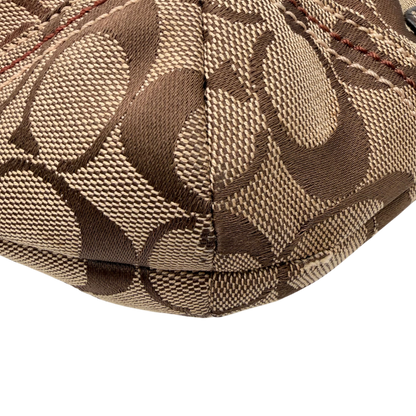 https://cdn.shopify.com/s/files/1/0564/9376/8855/files/Coach_Schultertasche_Hobo_Signature_beige_vintage5192.png?v=1776767886