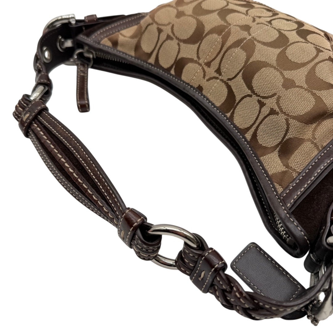 https://cdn.shopify.com/s/files/1/0564/9376/8855/files/Coach_Schultertasche_Hobo_Signature_beige_vintage5194.png?v=1776767886