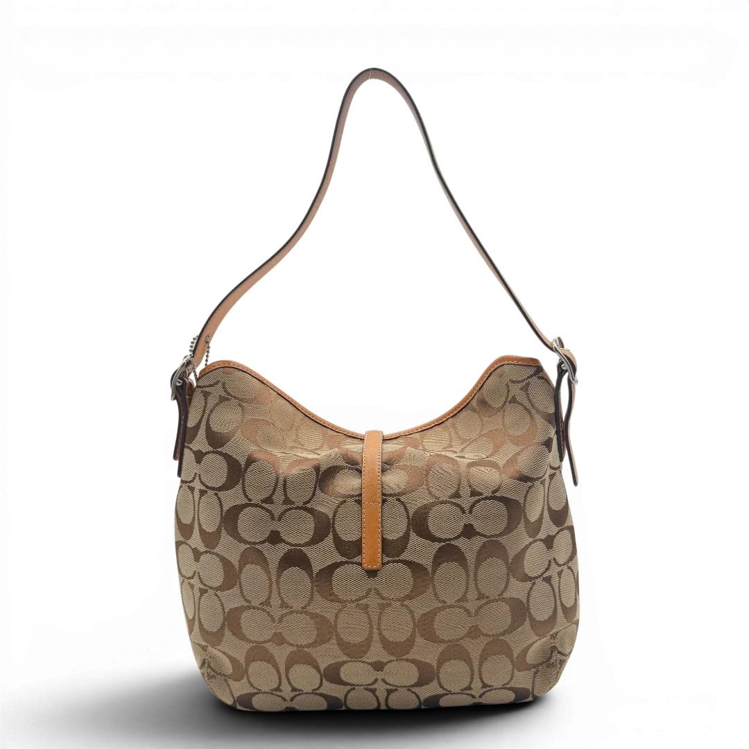 https://cdn.shopify.com/s/files/1/0564/9376/8855/files/Coach_Schultertasche_Jackie_Bucket_Signature_beige_2.webp?v=1782312193