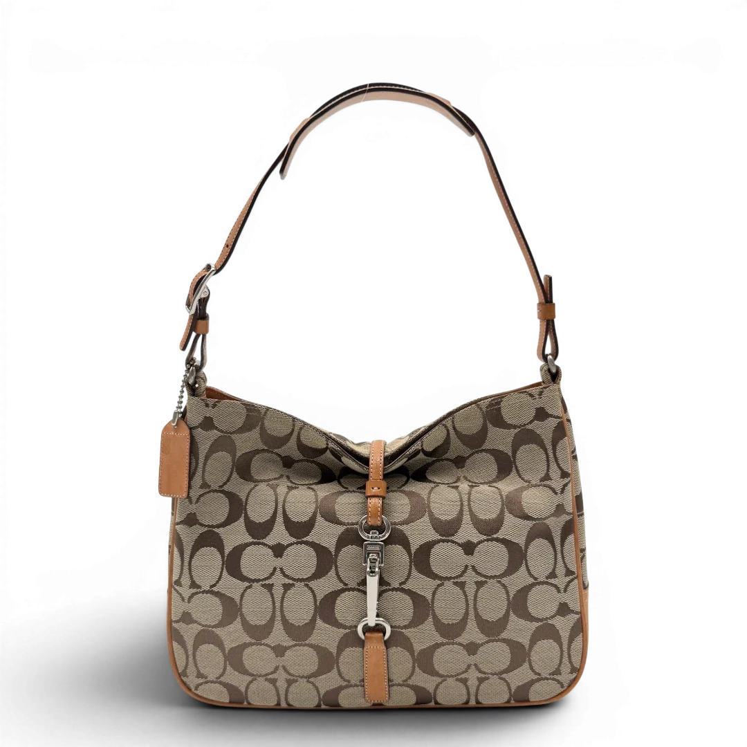 https://cdn.shopify.com/s/files/1/0564/9376/8855/files/Coach_Schultertasche_Jackie_Signature_beige_vintage7904.webp?v=1780489714