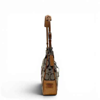 https://cdn.shopify.com/s/files/1/0564/9376/8855/files/Coach_Schultertasche_Jackie_Signature_beige_vintage7910.webp?v=1780489713