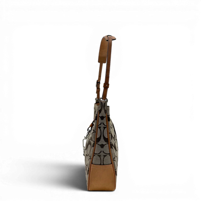 https://cdn.shopify.com/s/files/1/0564/9376/8855/files/Coach_Schultertasche_Jackie_Signature_beige_vintage7911.webp?v=1780489713