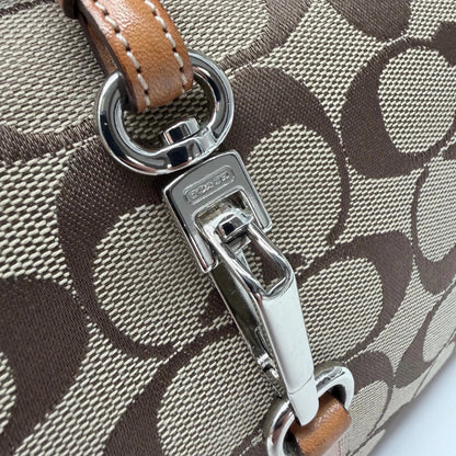 https://cdn.shopify.com/s/files/1/0564/9376/8855/files/Coach_Schultertasche_Jackie_Signature_beige_vintage7921.webp?v=1780489714