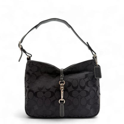 https://cdn.shopify.com/s/files/1/0564/9376/8855/files/Coach_Schultertasche_Jackie_Signature_schwarz_1.webp?v=1782310599