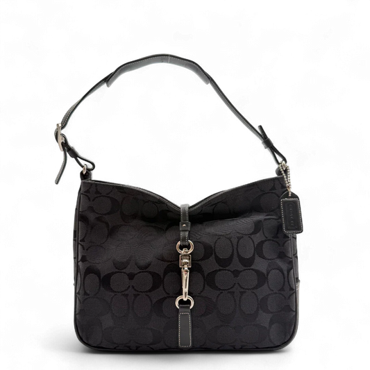 https://cdn.shopify.com/s/files/1/0564/9376/8855/files/Coach_Schultertasche_Jackie_Signature_schwarz_1.webp?v=1782310599