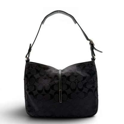 https://cdn.shopify.com/s/files/1/0564/9376/8855/files/Coach_Schultertasche_Jackie_Signature_schwarz_2.webp?v=1782310599