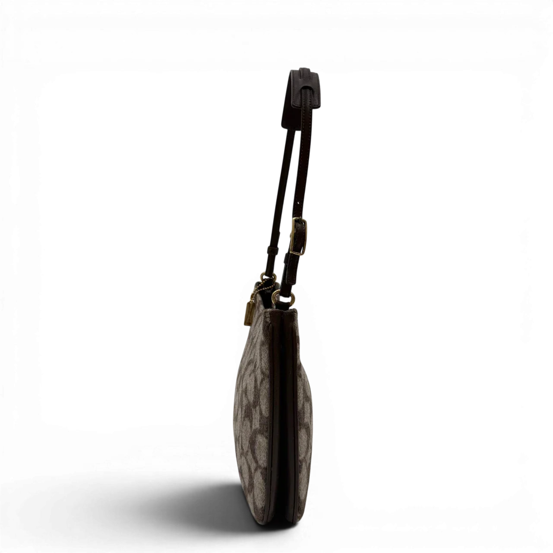 https://cdn.shopify.com/s/files/1/0564/9376/8855/files/Coach_Schultertasche_Signature_aus_Wolle_beige_vintage7714.webp?v=1780487596