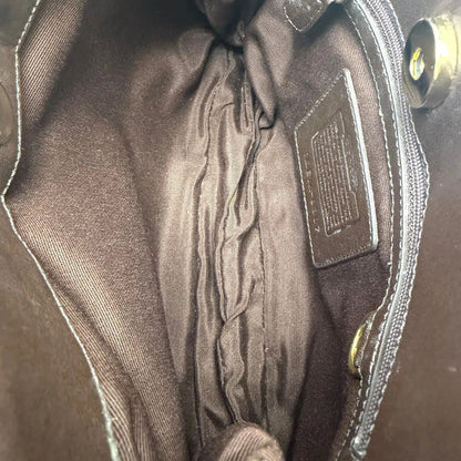 https://cdn.shopify.com/s/files/1/0564/9376/8855/files/Coach_Schultertasche_Signature_aus_Wolle_beige_vintage7726.webp?v=1780487597