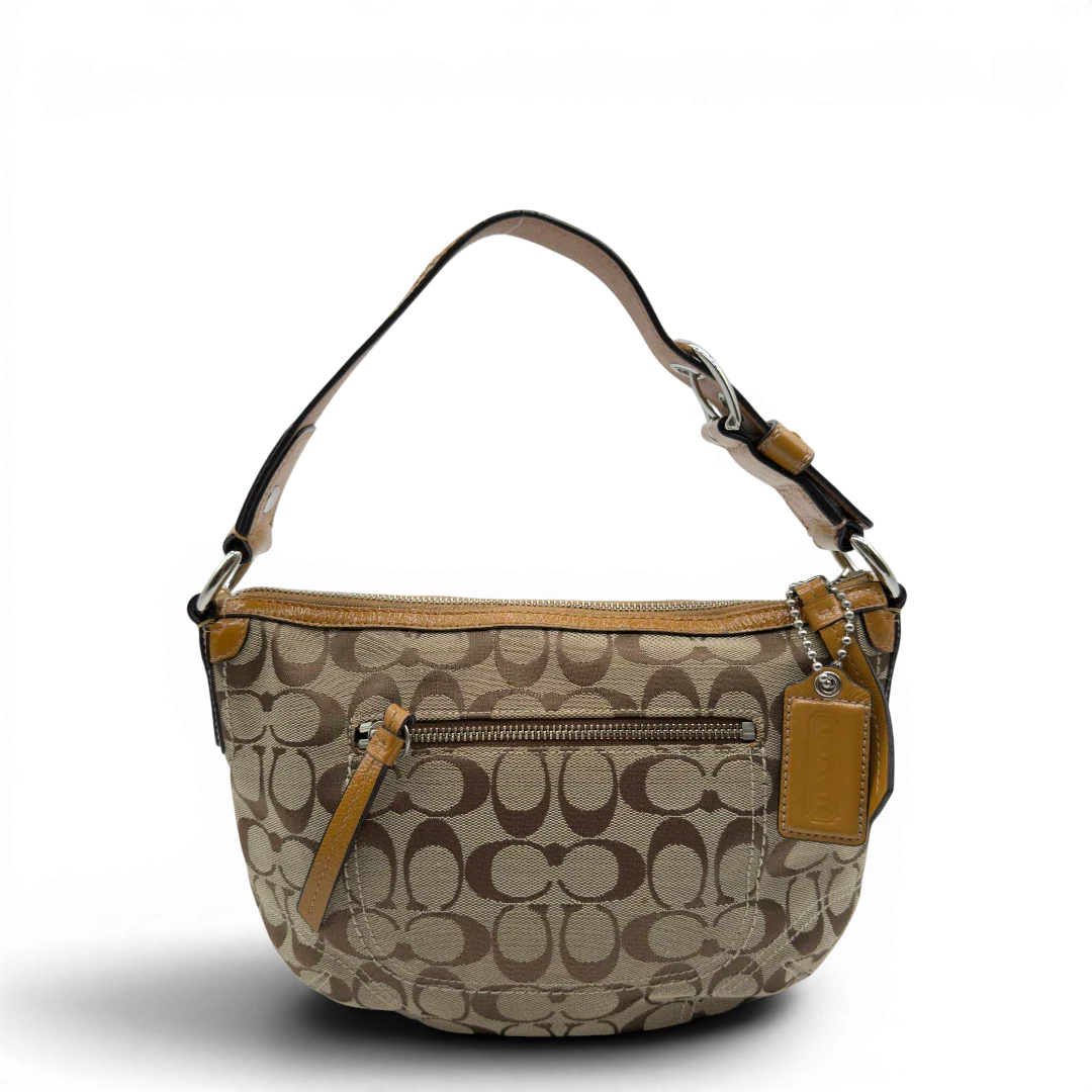 https://cdn.shopify.com/s/files/1/0564/9376/8855/files/Coach_Schultertasche_Signature_beige_1.webp?v=1782896647