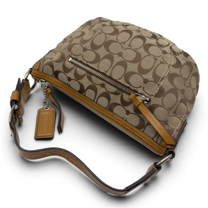 https://cdn.shopify.com/s/files/1/0564/9376/8855/files/Coach_Schultertasche_Signature_beige_10.webp?v=1782896647