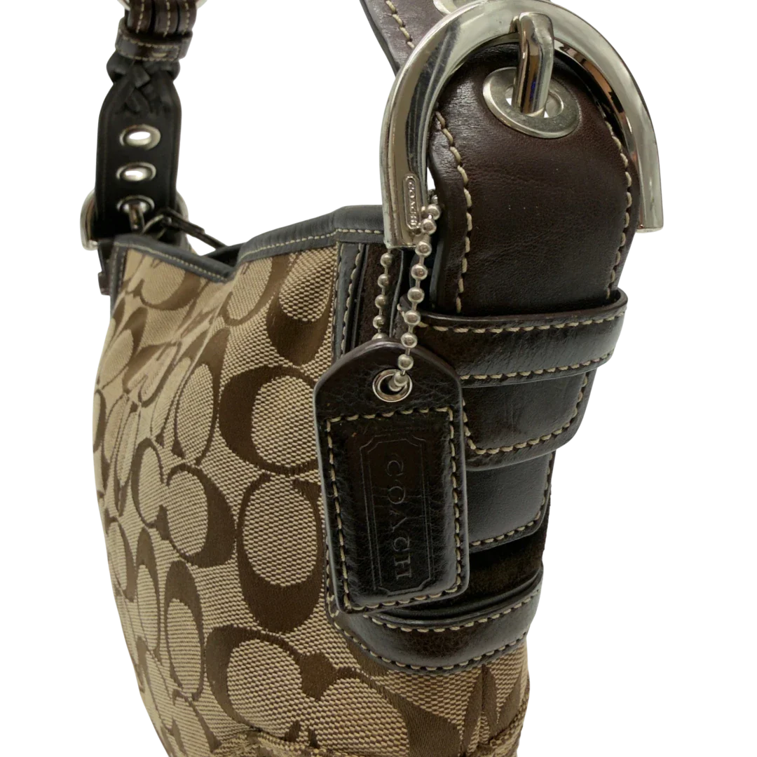 https://cdn.shopify.com/s/files/1/0564/9376/8855/files/Coach_Schultertasche_Signature_beige_11_547b4c20-a62a-4b65-b511-f7b9cf5143ca.webp?v=1782903794