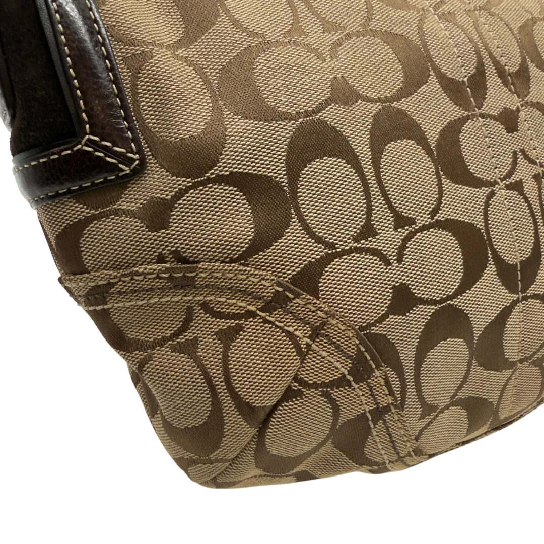 https://cdn.shopify.com/s/files/1/0564/9376/8855/files/Coach_Schultertasche_Signature_beige_13_cdc438c3-a718-4df6-9eb2-3cd75310731b.webp?v=1782903796