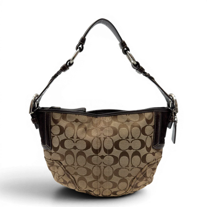 https://cdn.shopify.com/s/files/1/0564/9376/8855/files/Coach_Schultertasche_Signature_beige_1_c8aa7d95-1aff-46fa-acf2-159b2f7f5f5c.webp?v=1782903794